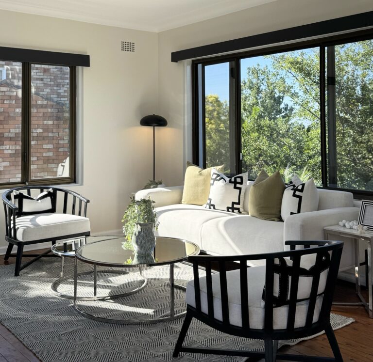 Modern bedroom interior design with cozy bedding, warm lighting, and contemporary furniture